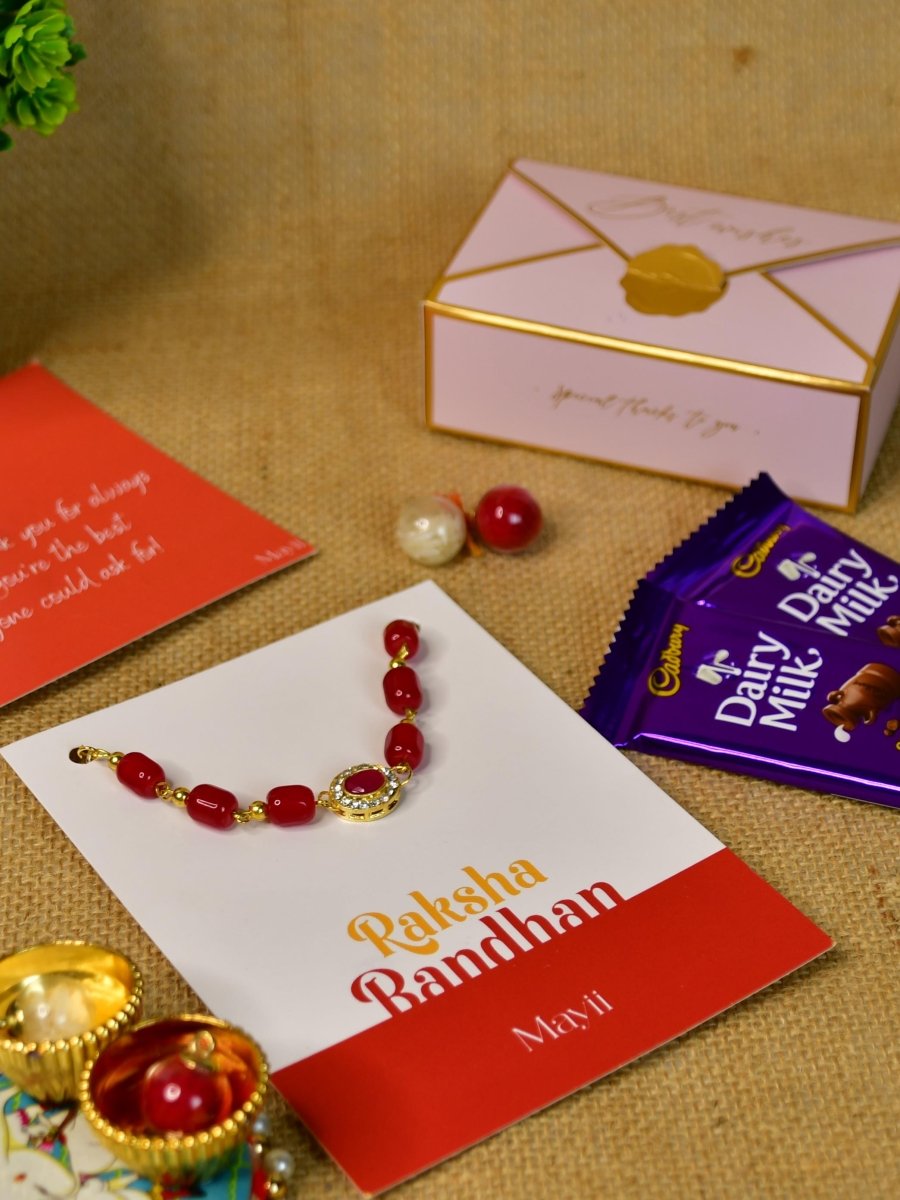 Sowpeace Exquisite Red Beads Rakhi Pack of 1 with Roli Chawal Thali, Chocolates, and Greeting card combo for Raksha Bandhan and Gifting - Rakhi - Sowpeace - Default Title - RAK - REDBD - HND - P3 - Sowpeace