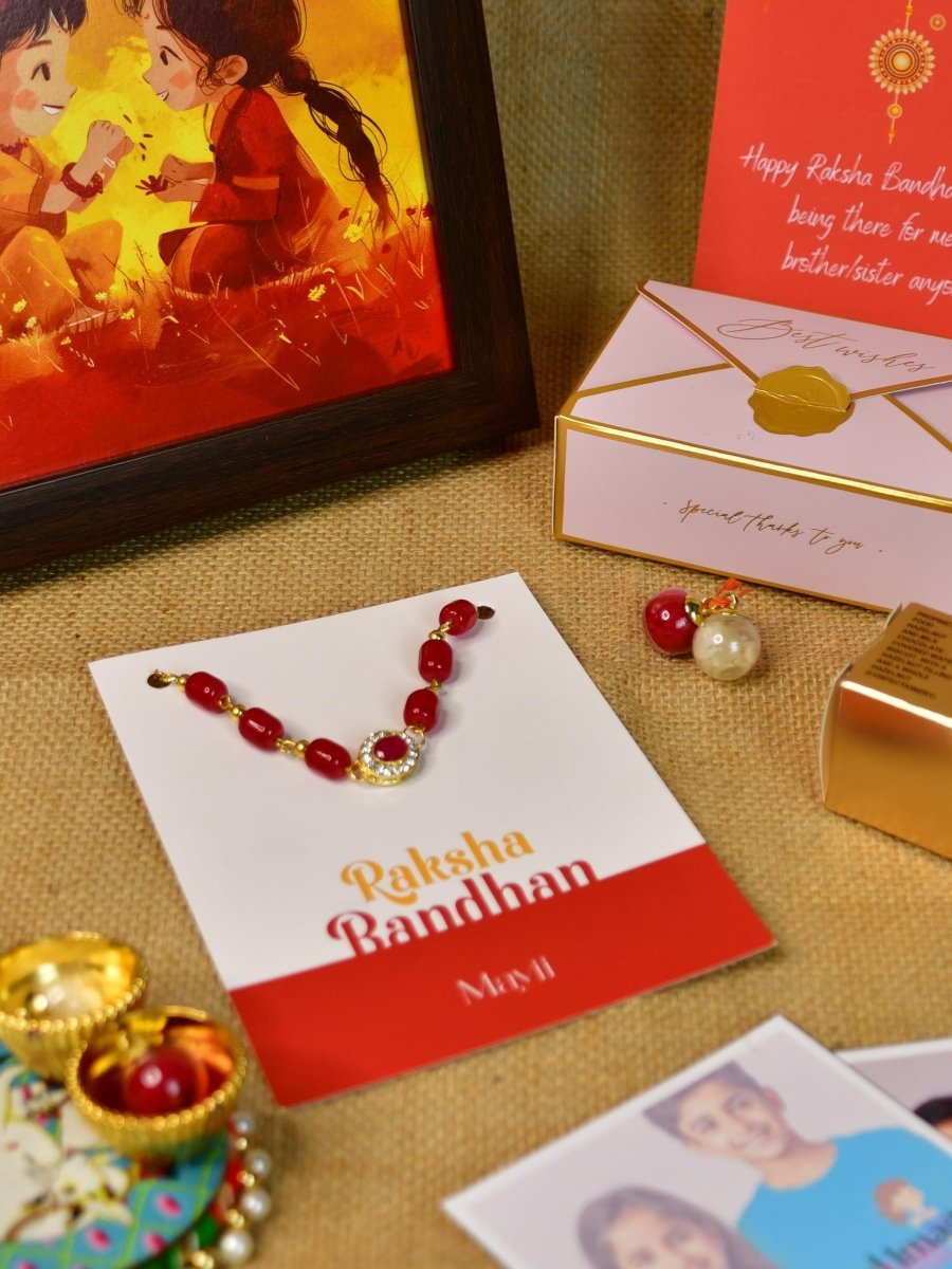 Sowpeace Exquisite Red Beads Rakhi Pack of 1 with Roli Chawal Thali, Chocolates, Photo Frame, Poloroids and Greeting card combo for Raksha Bandhan and Gifting - Rakhi - Sowpeace - Default Title - RAK - REDBD - HND - P7 - Sowpeace