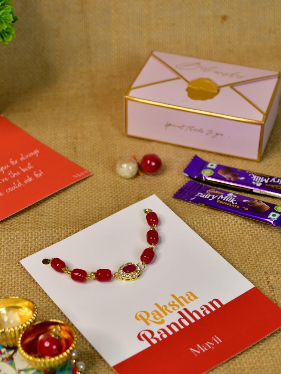 Sowpeace Exquisite Red Beads Rakhi Pack of 1 with Roli Chawal Thali, two Chocolates, and Greeting card combo for Raksha Bandhan and Gifting - Rakhi - Sowpeace - Default Title - RAK - REDBD - HND - P2 - Sowpeace