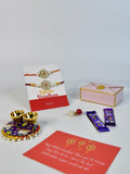 Sowpeace Exquisite Red Centre Flower Rakhi Pack of 1 with Roli Chawal Thali, two Chocolates, and Greeting card combo for Raksha Bandhan and Gifting - Rakhi - Sowpeace - Sowpeace Exquisite Red Centre Flower Rakhi Pack of 1 with Roli Chawal Thali, two Chocolates, and Greeting card combo for Raksha Bandhan and Gifting - RAK - CRFL - HND - P2 - Sowpeace