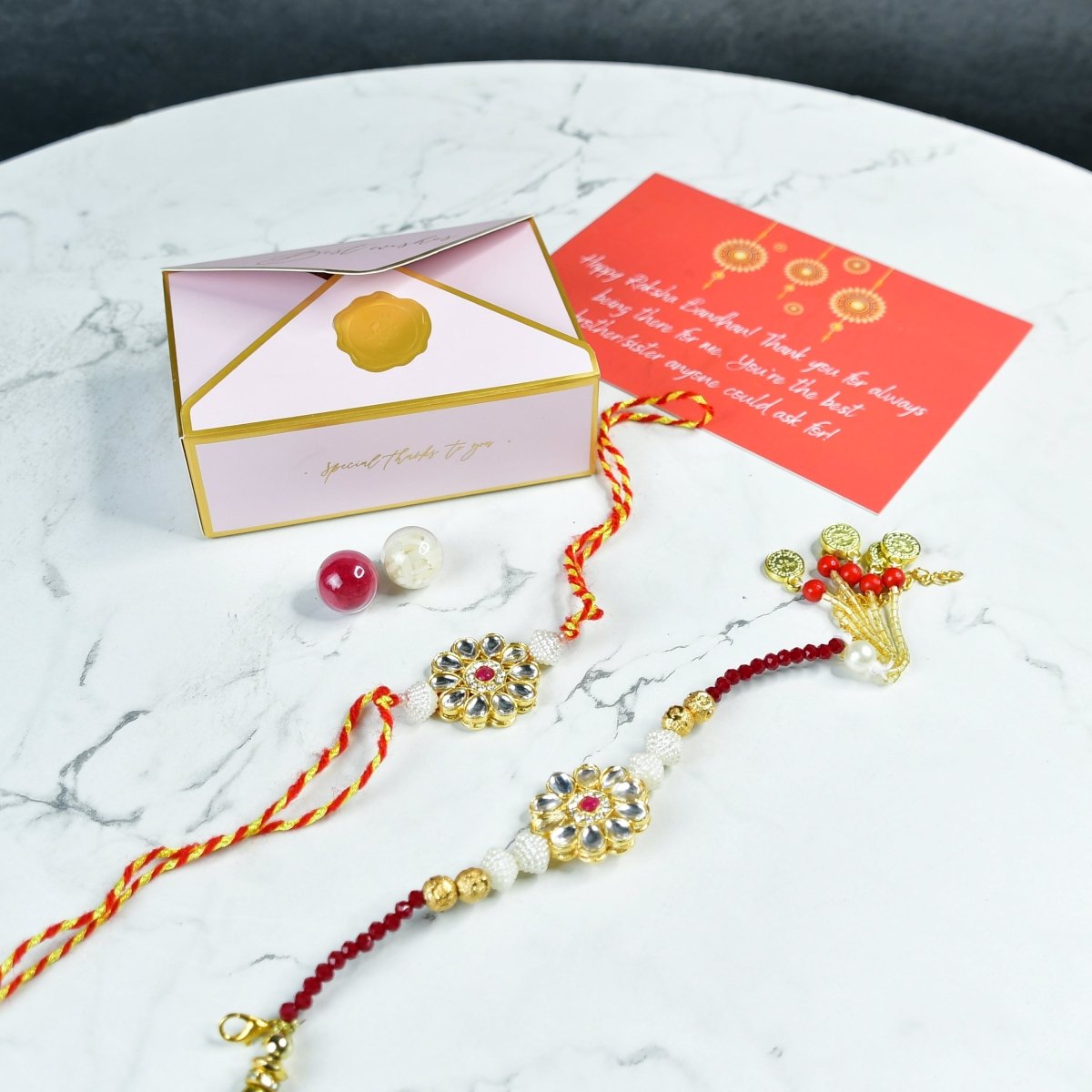 Sowpeace Exquisite Red Centre Flower Rakhi Pack of 2 with Roli Chawal and Greeting card combo for Raksha Bandhan and Gifting