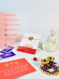 Sowpeace Exquisite Red Flower Rakhi Pack of 1 with Roli Chawal Thali, Chocolates, Buddha and Greeting card combo for Raksha Bandhan and Gifting - Rakhi - Sowpeace - Sowpeace Exquisite Red Flower Rakhi Pack of 1 with Roli Chawal Thali, Chocolates, Buddha and Greeting card combo for Raksha Bandhan and Gifting - RAK - RDFL - HND - P4 - Sowpeace