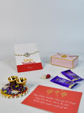 Sowpeace Exquisite Swastik Rakhi Pack of 1 with Roli Chawal Thali, Chocolates, and Greeting card combo for Raksha Bandhan and Gifting - Rakhi - Sowpeace - Default Title - RAK - STK - HND - P3 - Sowpeace