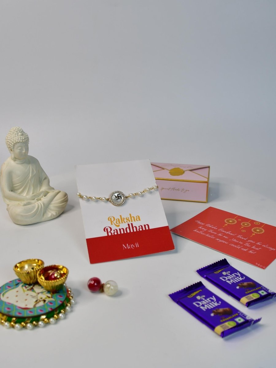 Sowpeace Exquisite Swastik Rakhi Pack of 1 with Roli Chawal Thali, Chocolates, Buddha and Greeting card combo for Raksha Bandhan and Gifting