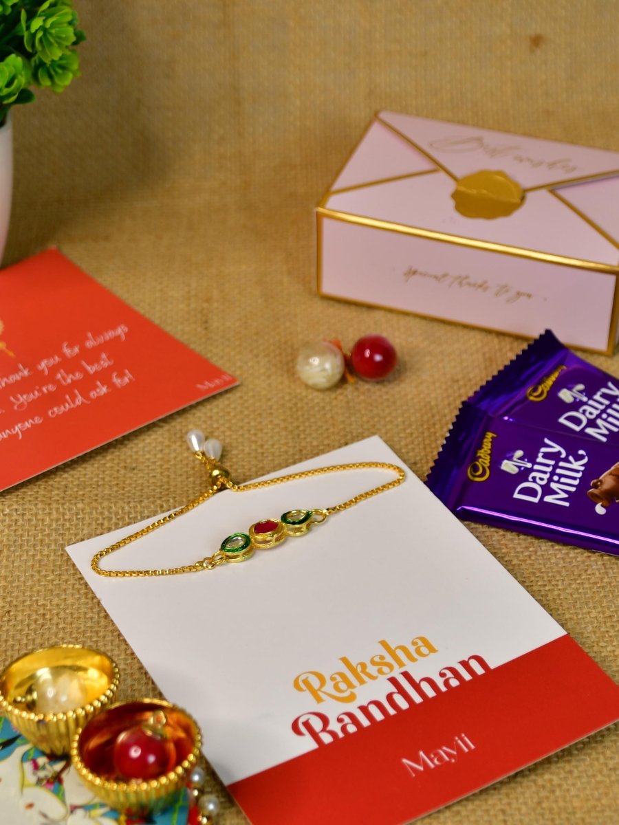 Sowpeace Exquisite Tri Red Green Rakhi Pack of 1 with Roli Chawal Thali, Chocolates, and Greeting card combo for Raksha Bandhan and Gifting