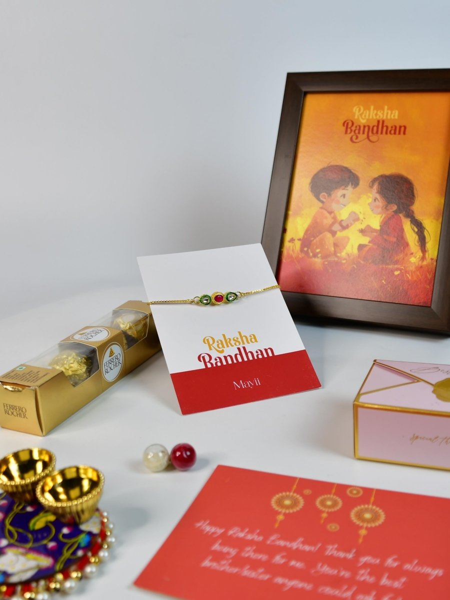 Sowpeace Exquisite Tri Red Green Rakhi Pack of 1 with Roli Chawal Thali, Chocolates, Photo Frame and Greeting card combo for Raksha Bandhan and Gifting