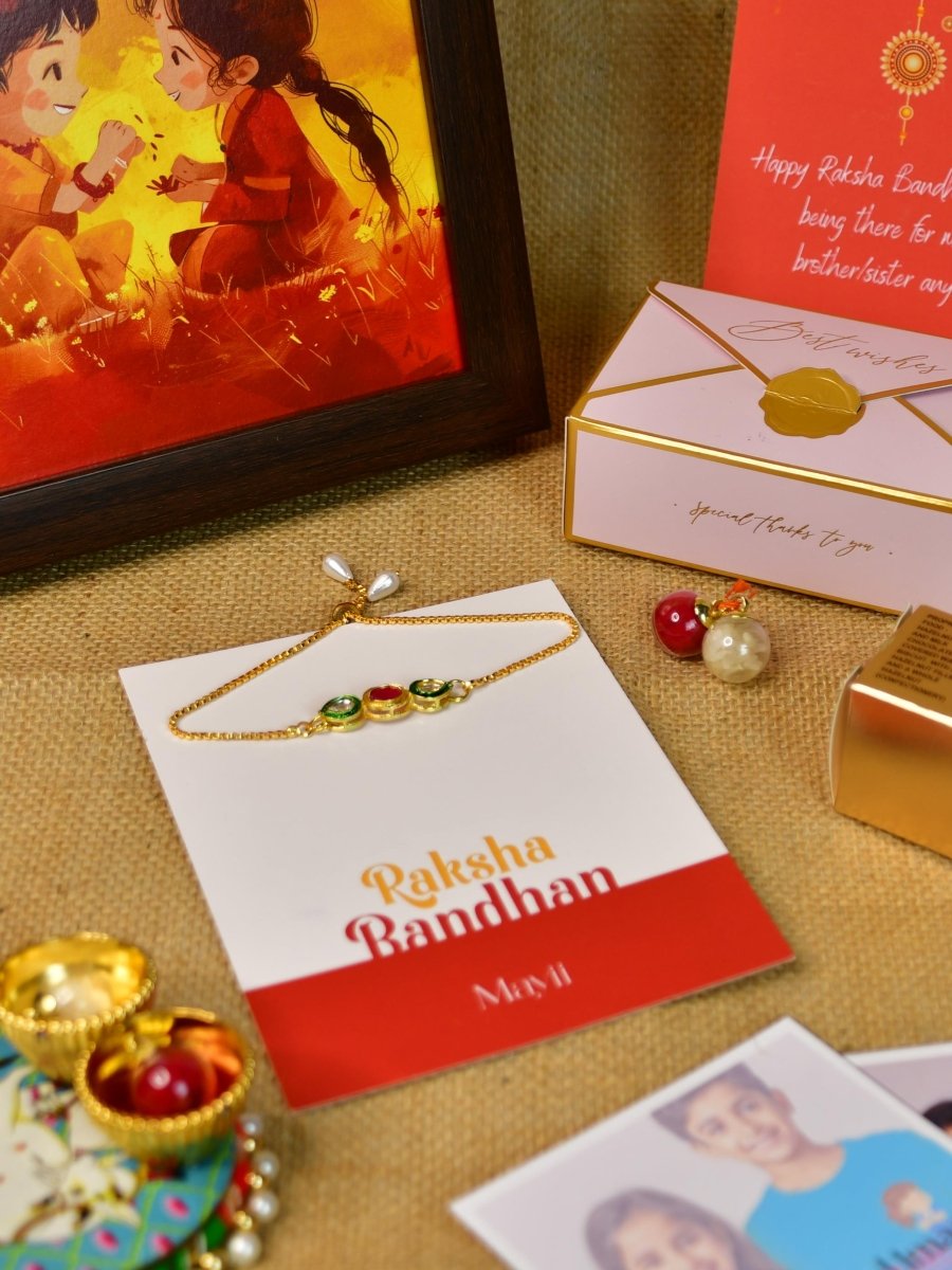 Sowpeace Exquisite Tri Red Green Rakhi Pack of 1 with Roli Chawal Thali, Chocolates, Photo Frame, Poloroids and Greeting card combo for Raksha Bandhan and Gifting