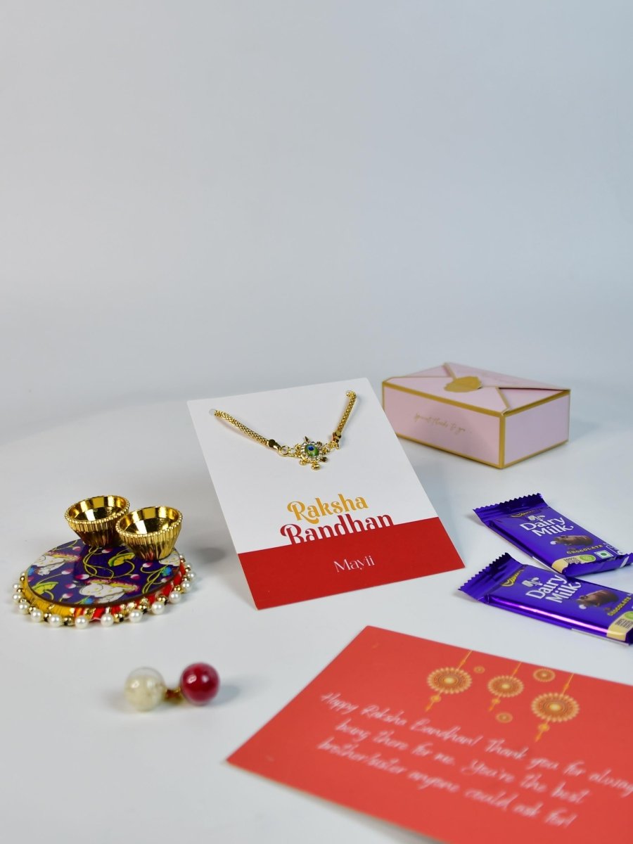 Sowpeace Exquisite Turtle Rakhi Pack of 1 with Roli Chawal Thali, Chocolates, and Greeting card combo for Raksha Bandhan and Gifting - Rakhi - Sowpeace - Default Title - RAK - TURT - HND - P3 - Sowpeace