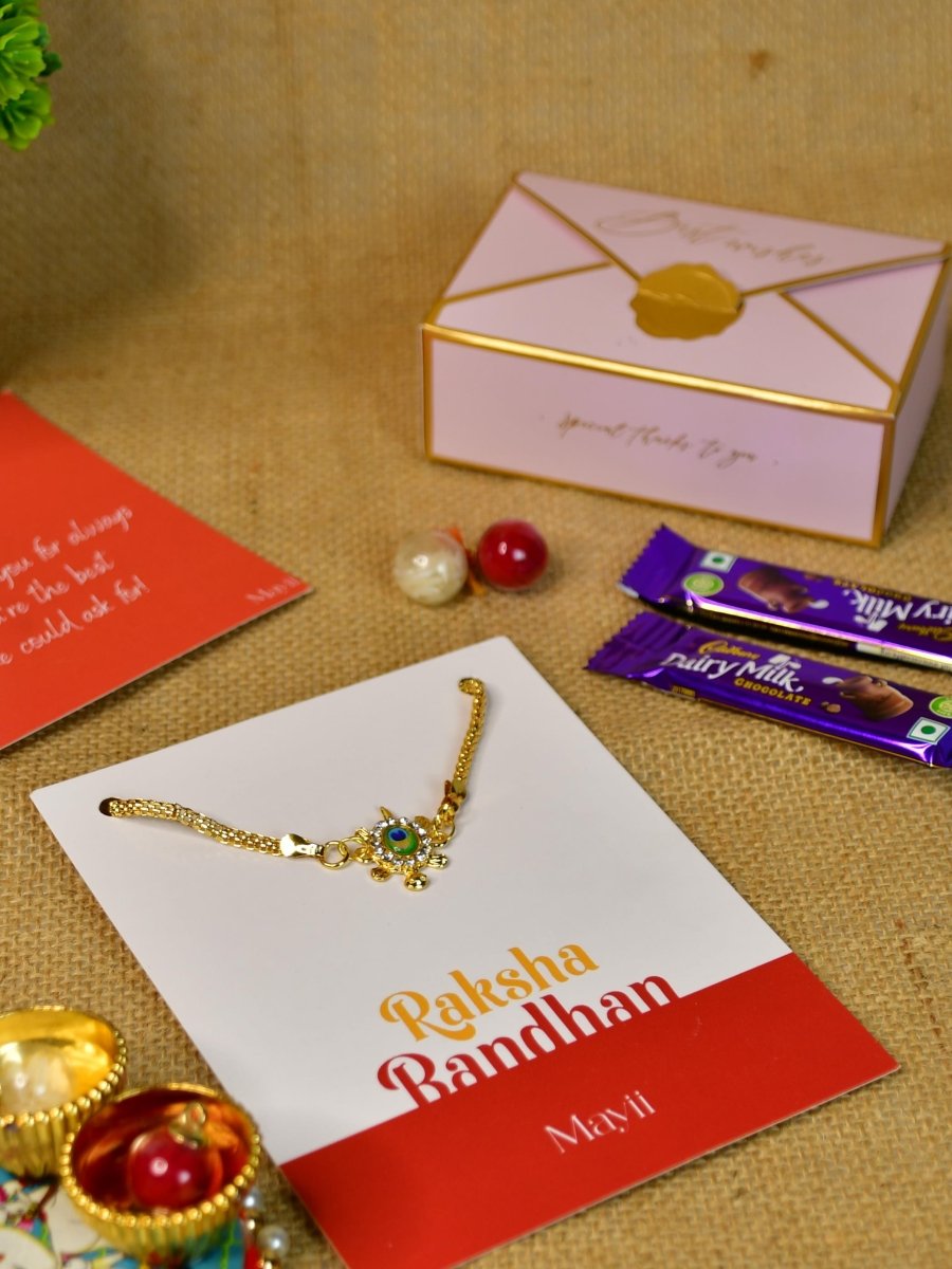 Sowpeace Exquisite Turtle Rakhi Pack of 1 with Roli Chawal Thali, two Chocolates, and Greeting card combo for Raksha Bandhan and Gifting