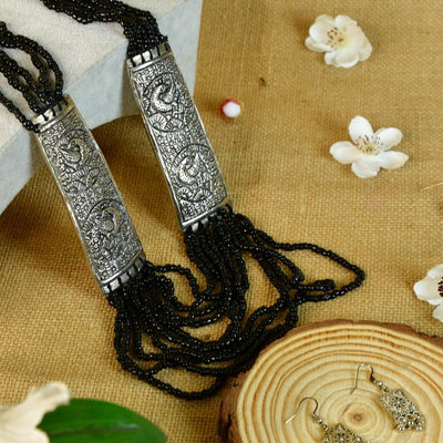 Sowpeace German Silver Necklace: Peacock Art on Metal with Black Beads