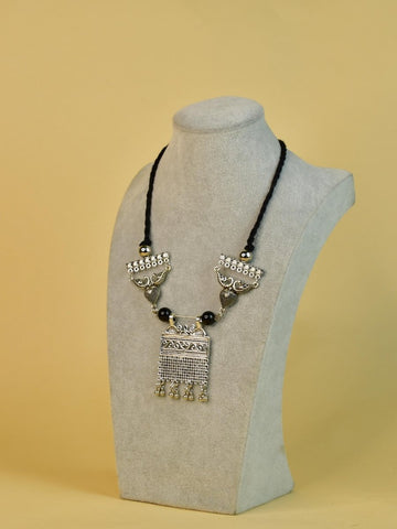 Vastu Principles for Sowpeace Handcrafted German Silver Choker: Peacock and Abstract Design