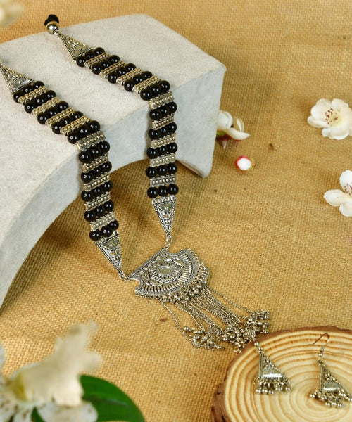 Sowpeace Handcrafted German Silver Necklace: Black Beads & Chain Drops