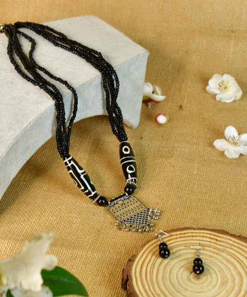 Sowpeace Handcrafted German Silver Necklace: Black Beads & Dzi Pendant