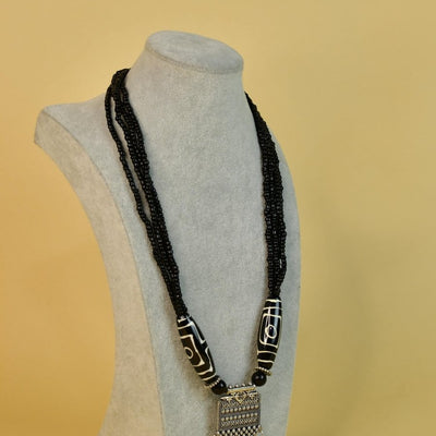 Sowpeace Handcrafted German Silver Necklace: Black Beads & Dzi Pendant