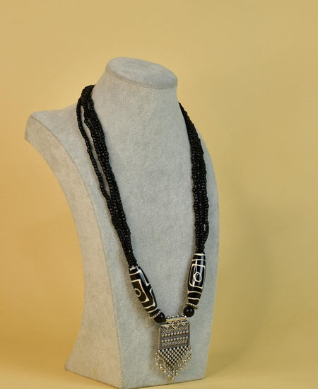 Sowpeace Handcrafted German Silver Necklace: Black Beads & Dzi Pendant