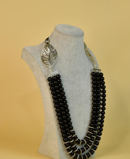 Sowpeace Handcrafted German Silver Necklace: Black Beads & Leaf Design
