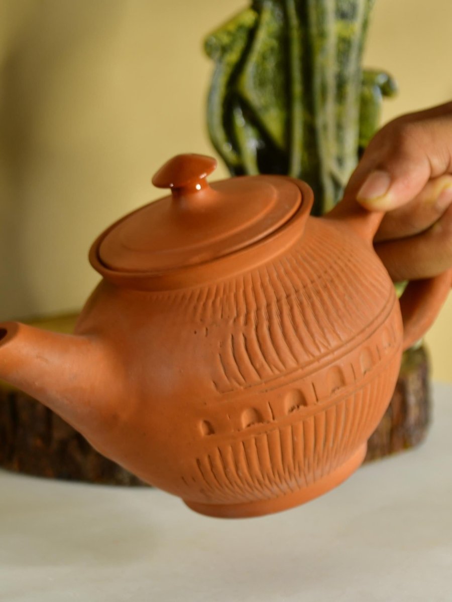 Terracotta Kettle: Artisan Charm for Home and Kitchen