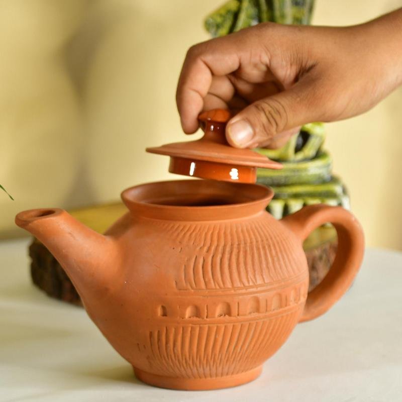 Terracotta Kettle: Artisan Charm for Home and Kitchen