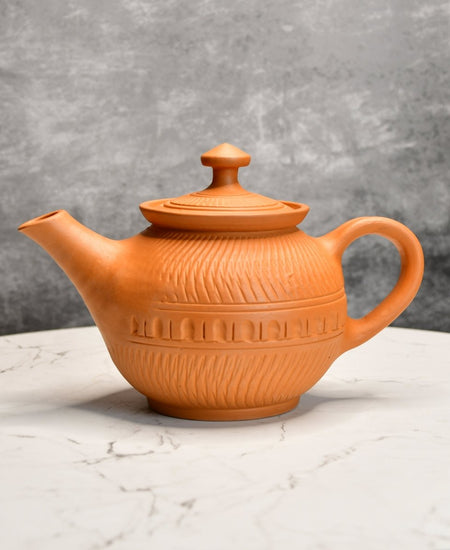 Terracotta Kettle: Artisan Charm for Home and Kitchen