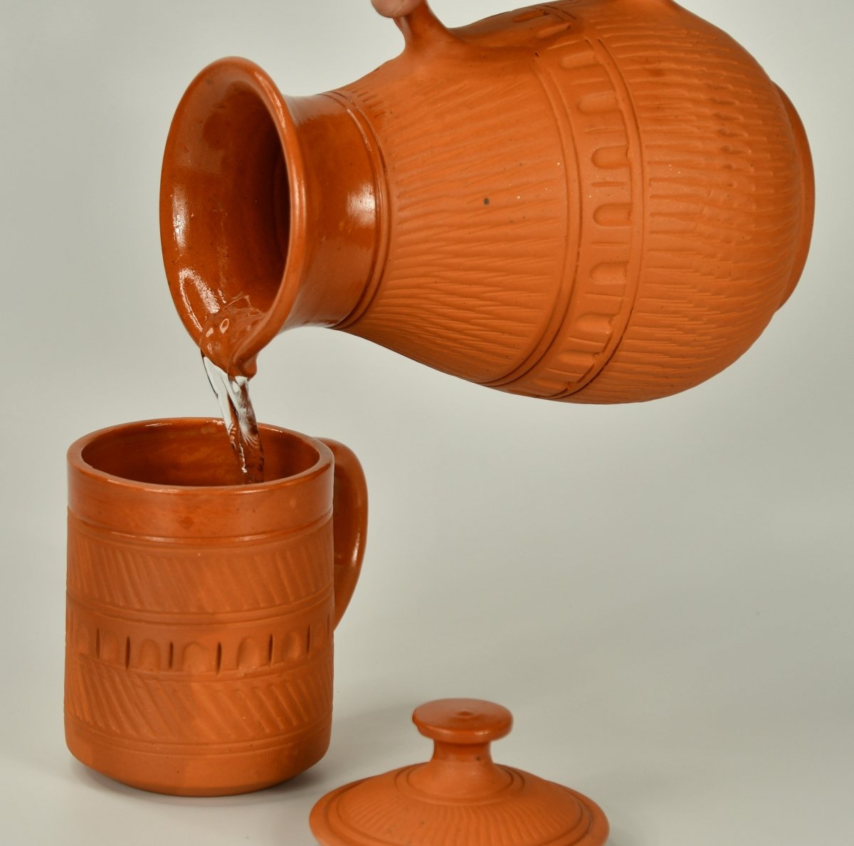 Terracotta Water Jug: Artisan Elegance for Home and Kitchen